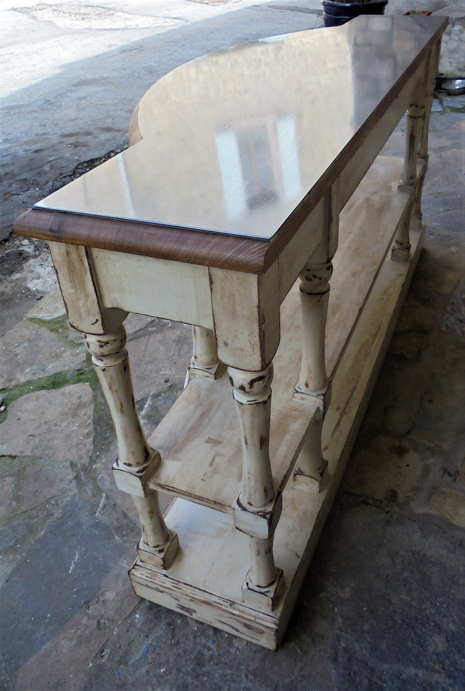 Wood console and polished steel top