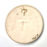 Relief mural signed in ceramic, sun with blue and gold face, 1990s.