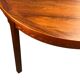 Round dining table in rosewood.