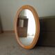 Vintage oval mirror in beech from the 70s/80s.