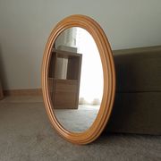 Vintage oval mirror in beech from the 70s/80s.
