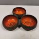 Beautiful bowl (composed of 3 bowls) with orange/red glaze inside
