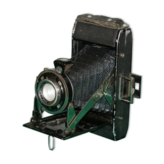 Vintage bellows camera with leather case