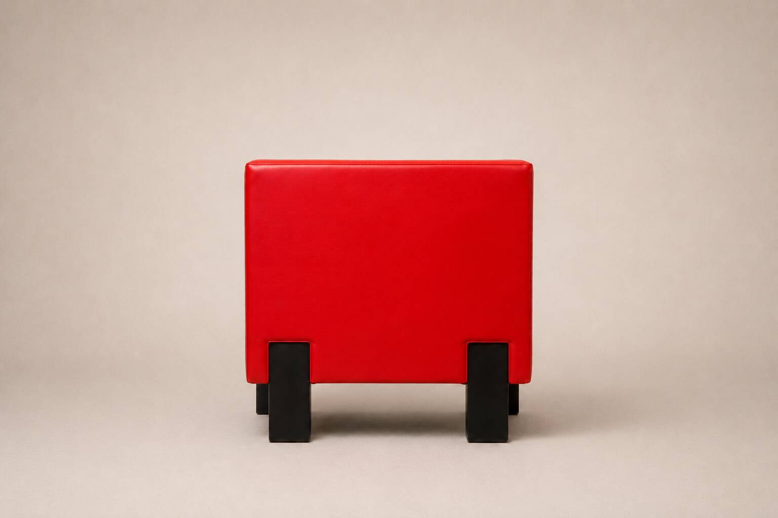 Uchida x Poltrona Frau — Pair of "Moji" armchairs in red leather