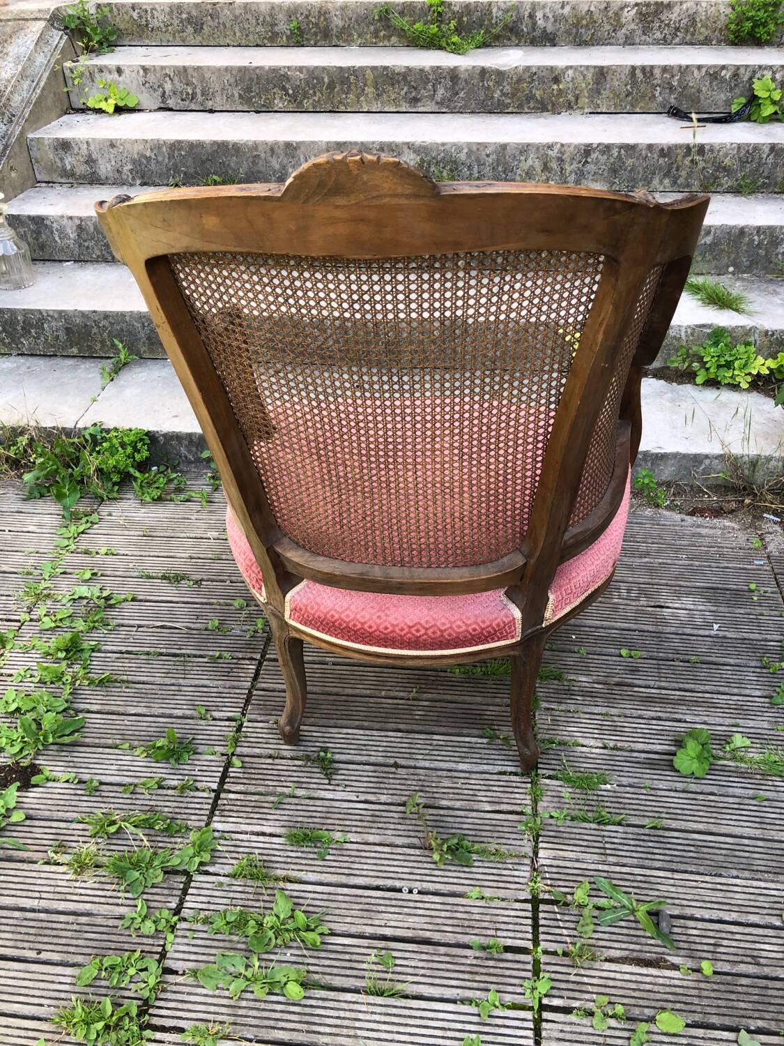 Louis XV style walnut and cane armchair