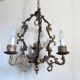 Italian Vintage patinated bronze chandelier with 4 lights with a beautiful wow patina