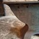 Old French industrial table with a cast iron base and a pine top.