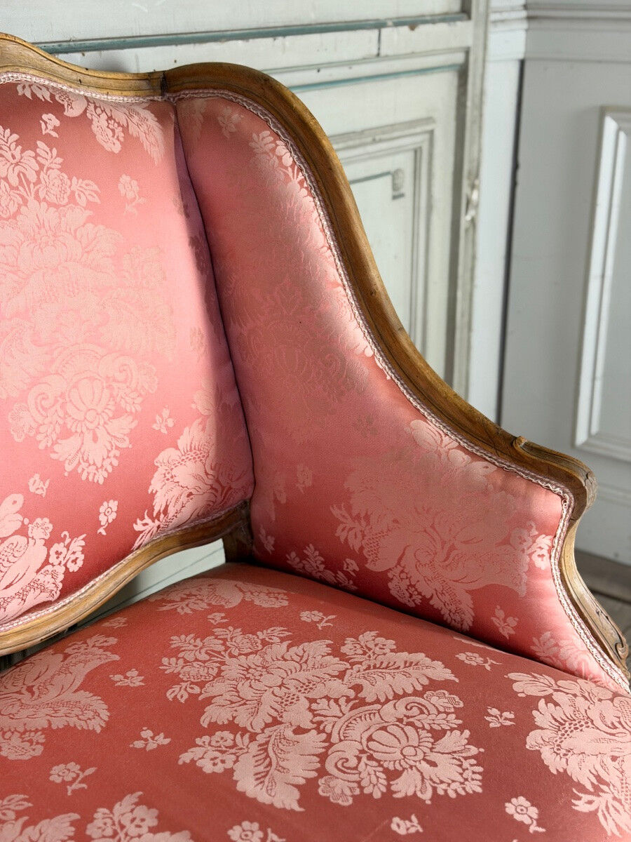 Louis XV bench in carved natural wood, 18th century