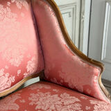 Louis XV bench in carved natural wood, 18th century