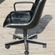 POLLOCK black leather reclining armchair with casters