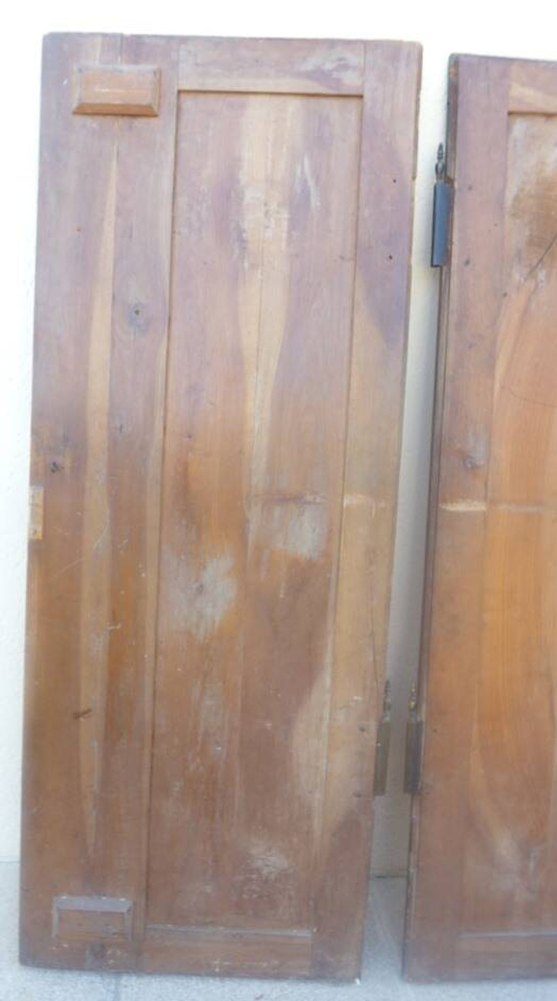 Pair of antique cherry wood cabinet doors from the 19th century in their original part