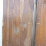 Pair of antique cherry wood cabinet doors from the 19th century in their original part