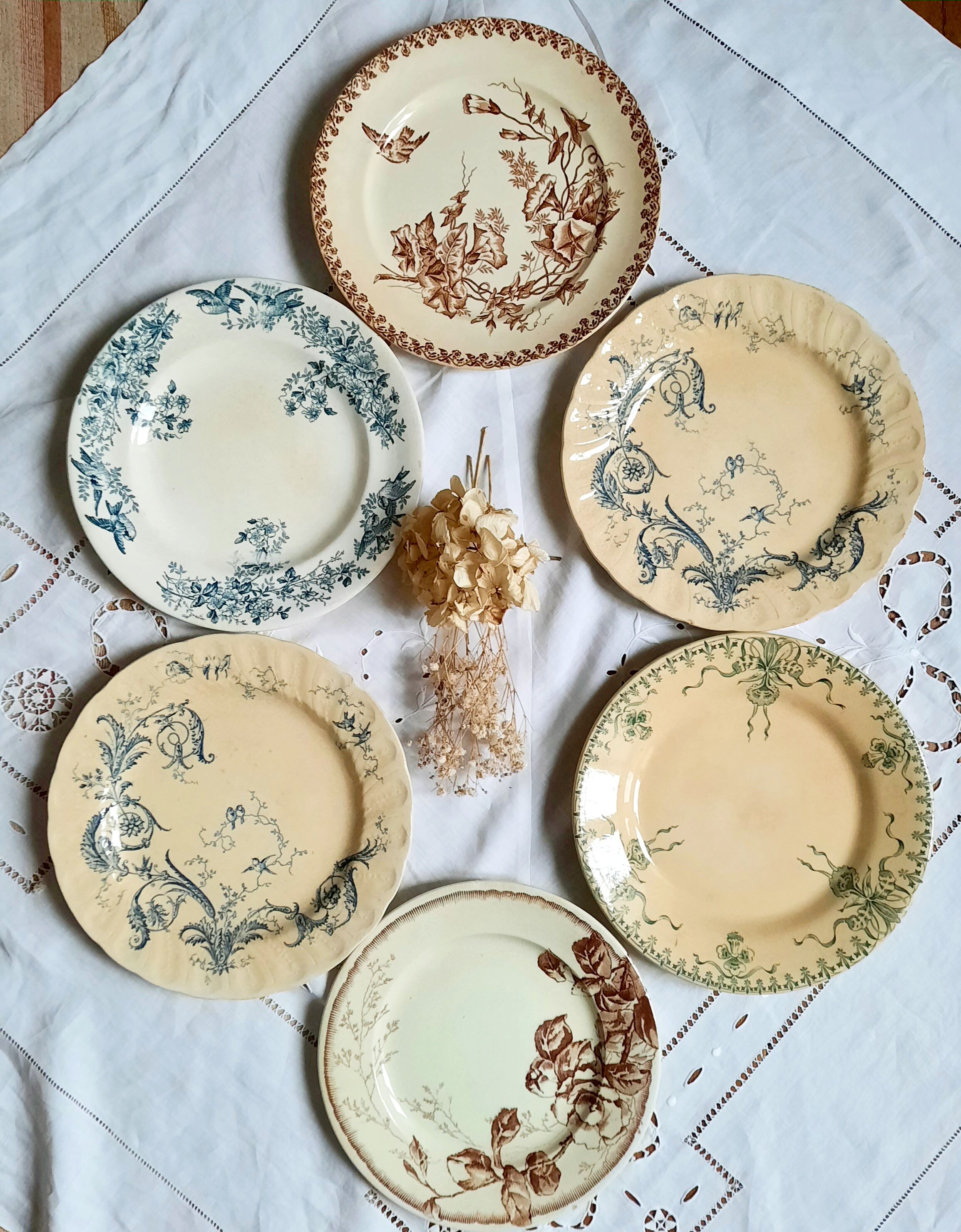Old flat plates mismatched in earthenware