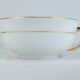 Green and gilded LIMOGES porcelain cup and cup lunch