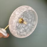 Vintage glass wall lamp with a white Clichy shade.
