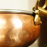 Copper cauldron with golden bronze bull heads