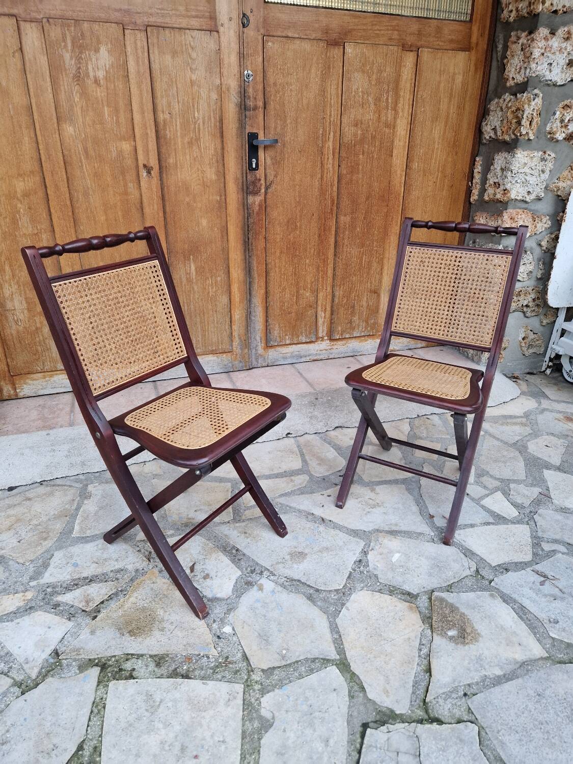 2 vintage caned folding chairs