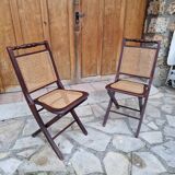 2 vintage caned folding chairs
