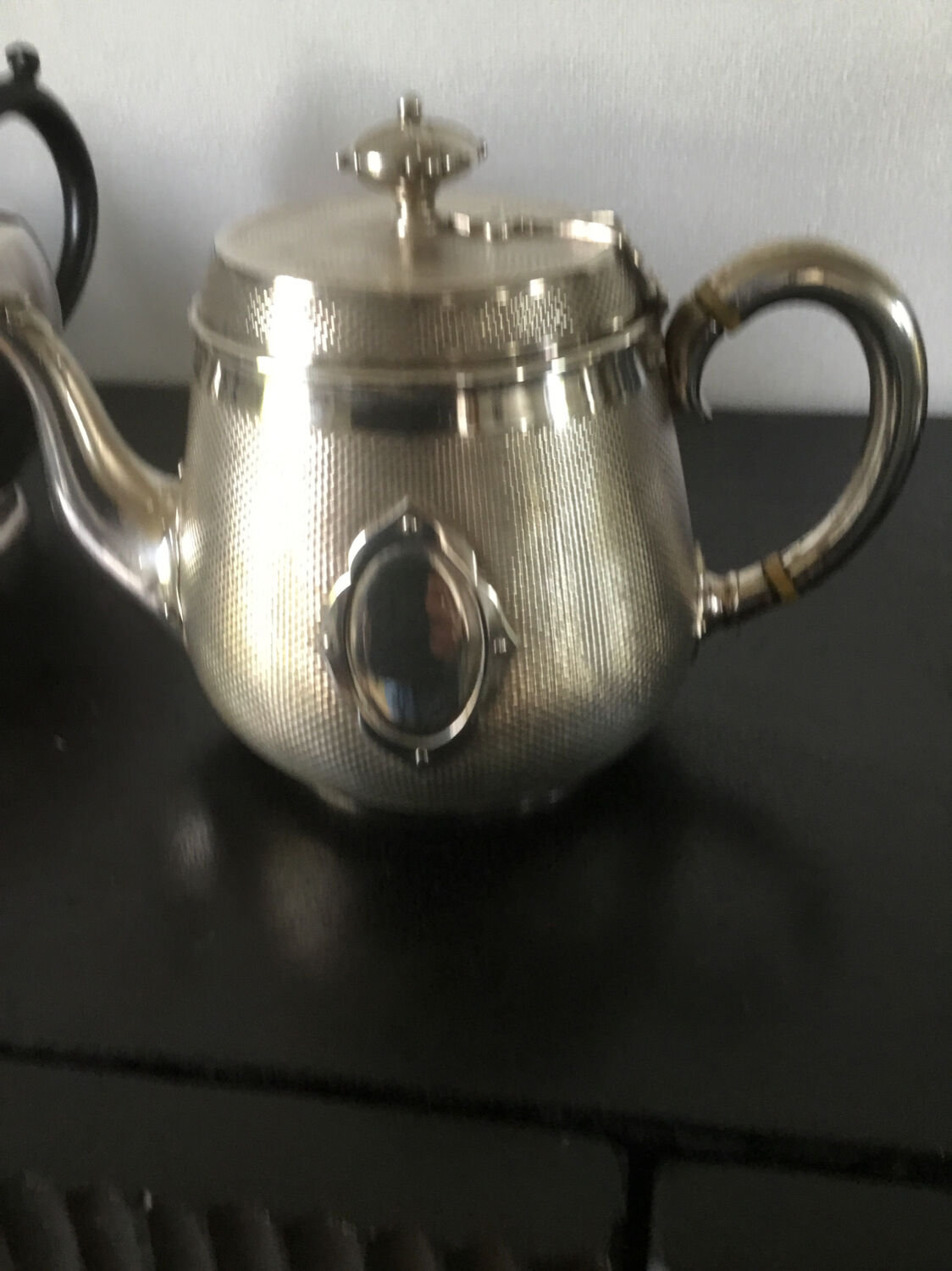 Set of teapots and milk jug.