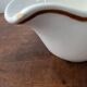 Digoin Sarreguemines sauceboat with hand-painted waterfowl decoration