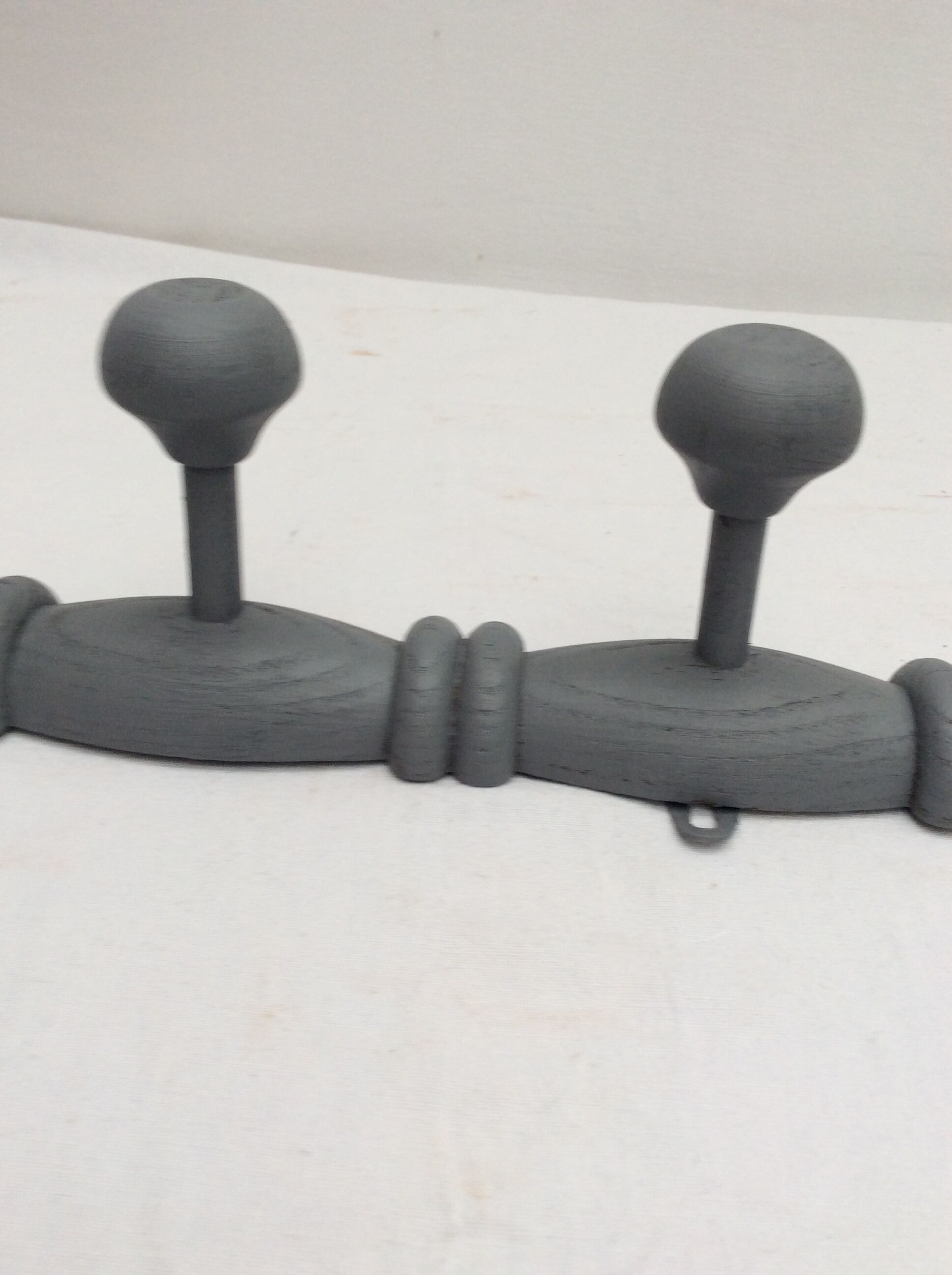 Grey wooden coat rack