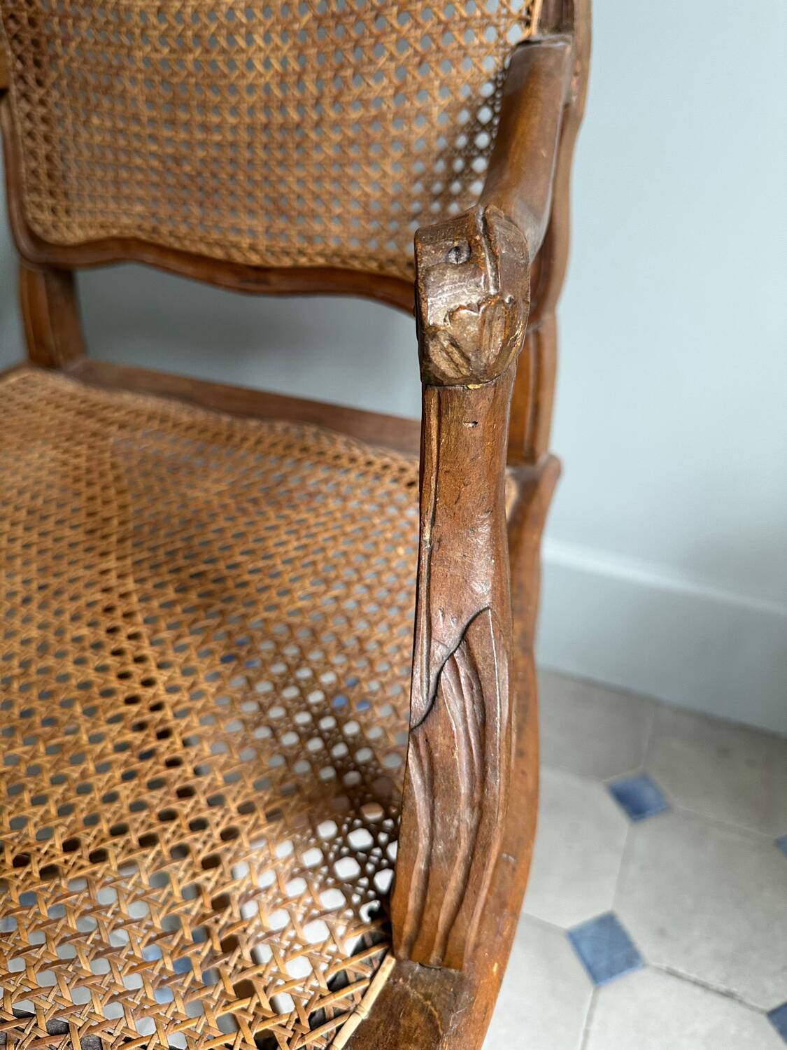 Regency armchair with stretcher