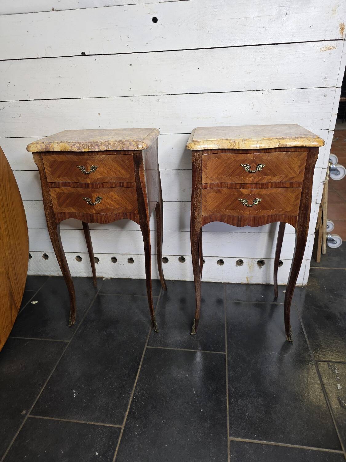 Pair of Louis XV style curved bedside tables in marquetry