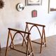 Pair of vintage rattan trestles