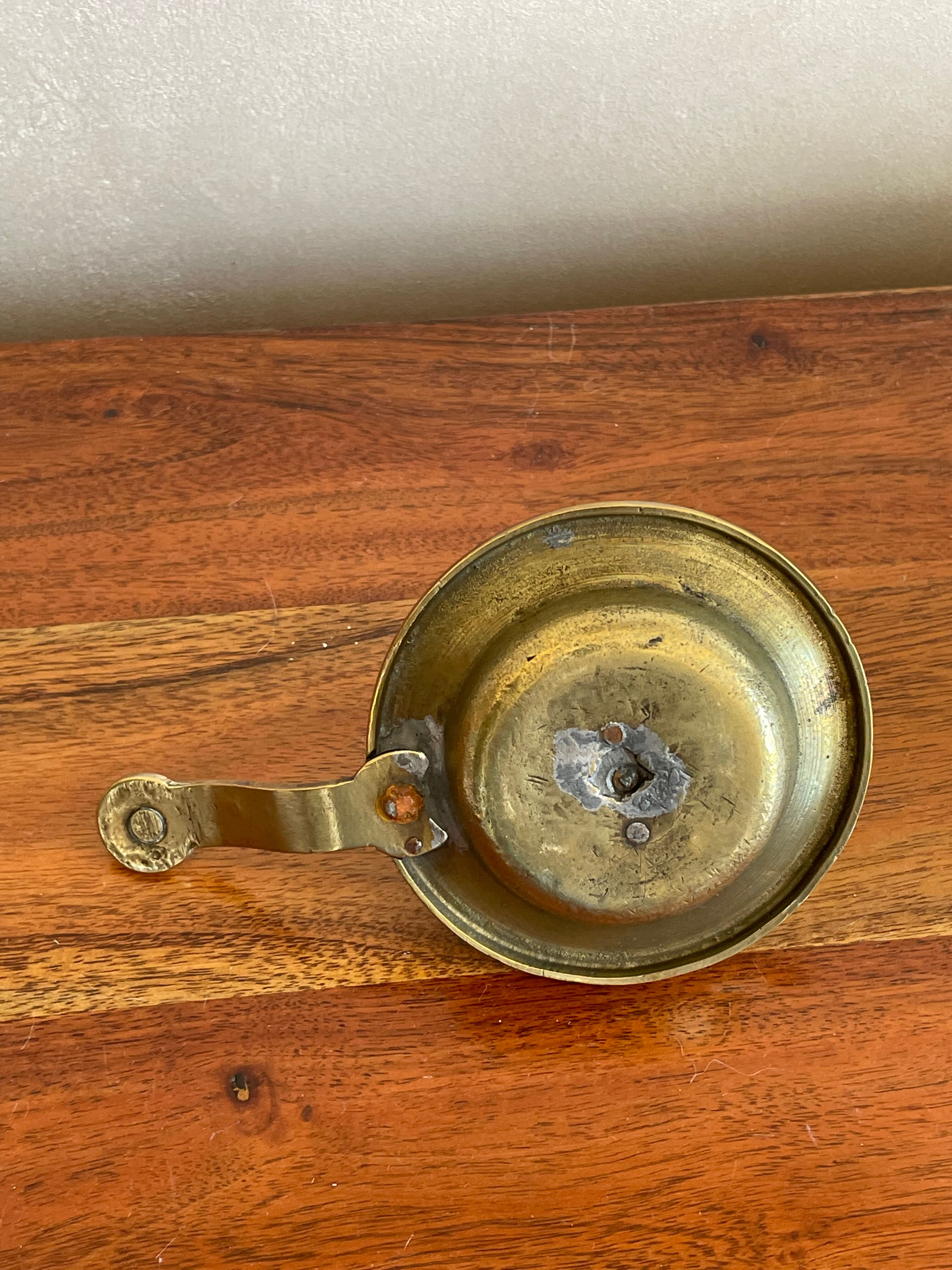 Brass hand candlestick