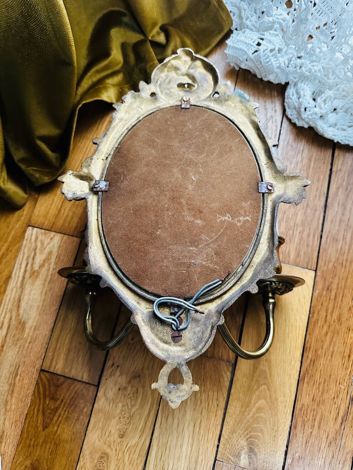 Antique bronze mirror wall sconce