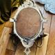 Antique bronze mirror wall sconce