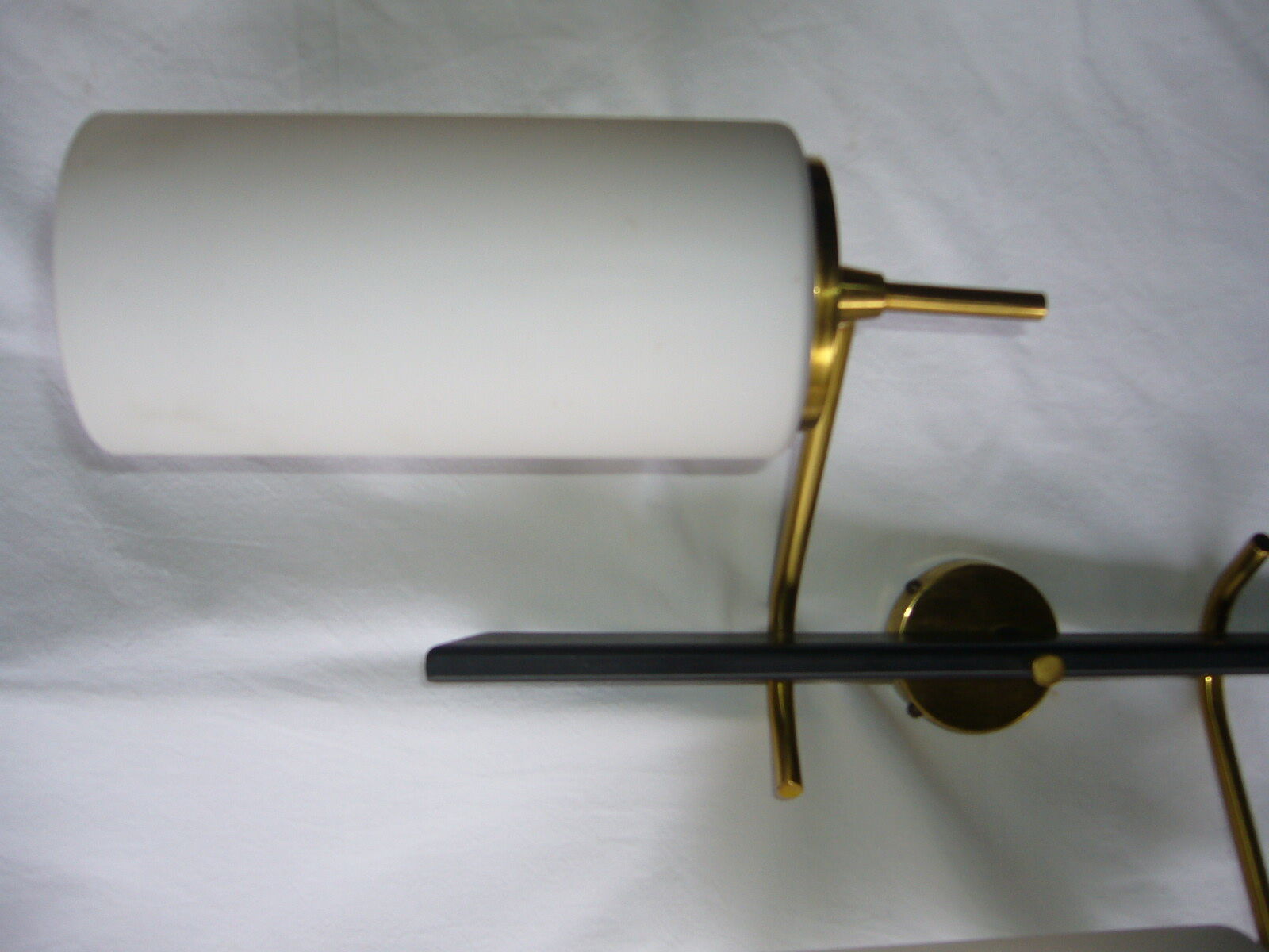 Black and gold metal sconces, Arlus house opalin lenses from the 1950s