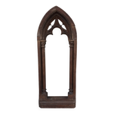 Gothic window frame with pointed arches and columns