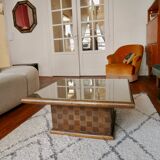 Square table in woven chestnut, with glass top