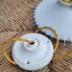 Serrated opaline suspension