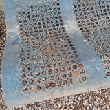 Former garden bench in perforated sheet metal