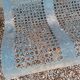 Former garden bench in perforated sheet metal