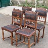 4 Henri II chairs in solid wood and leather from the 19th century.