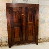 Old wooden doors of a Savoyard wardrobe chalet mountain vintage
