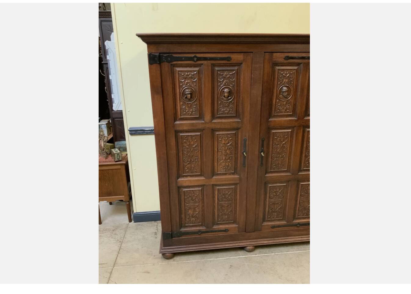 Antique neo-Gothic wardrobe with linen drawers.