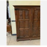 Antique neo-Gothic wardrobe with linen drawers.