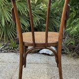 Baumann curved caned wood armchair, 1900