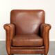 Sturdy vintage sheepskin armchair with a beautiful cognac colour