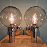 Pair of vintage wall lights in chromed metal and smoked glass, 70s