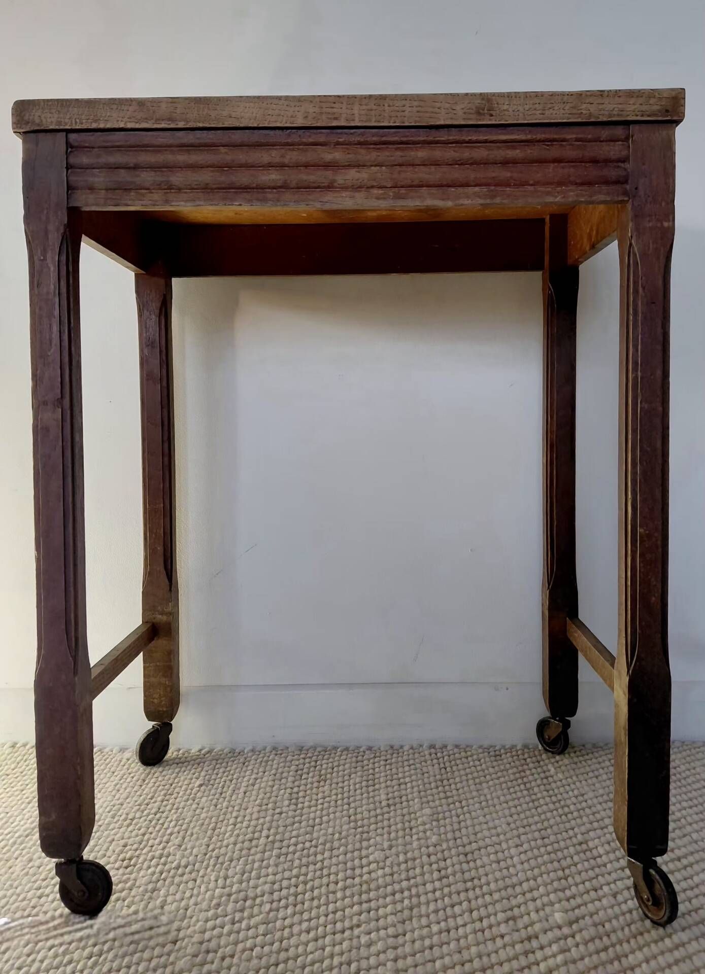 Vintage wooden wheeled side table/console.