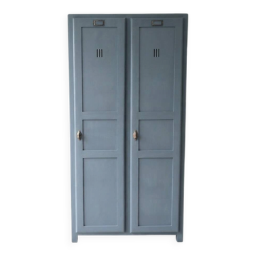 Vintage grey wooden wardrobe from 1914.