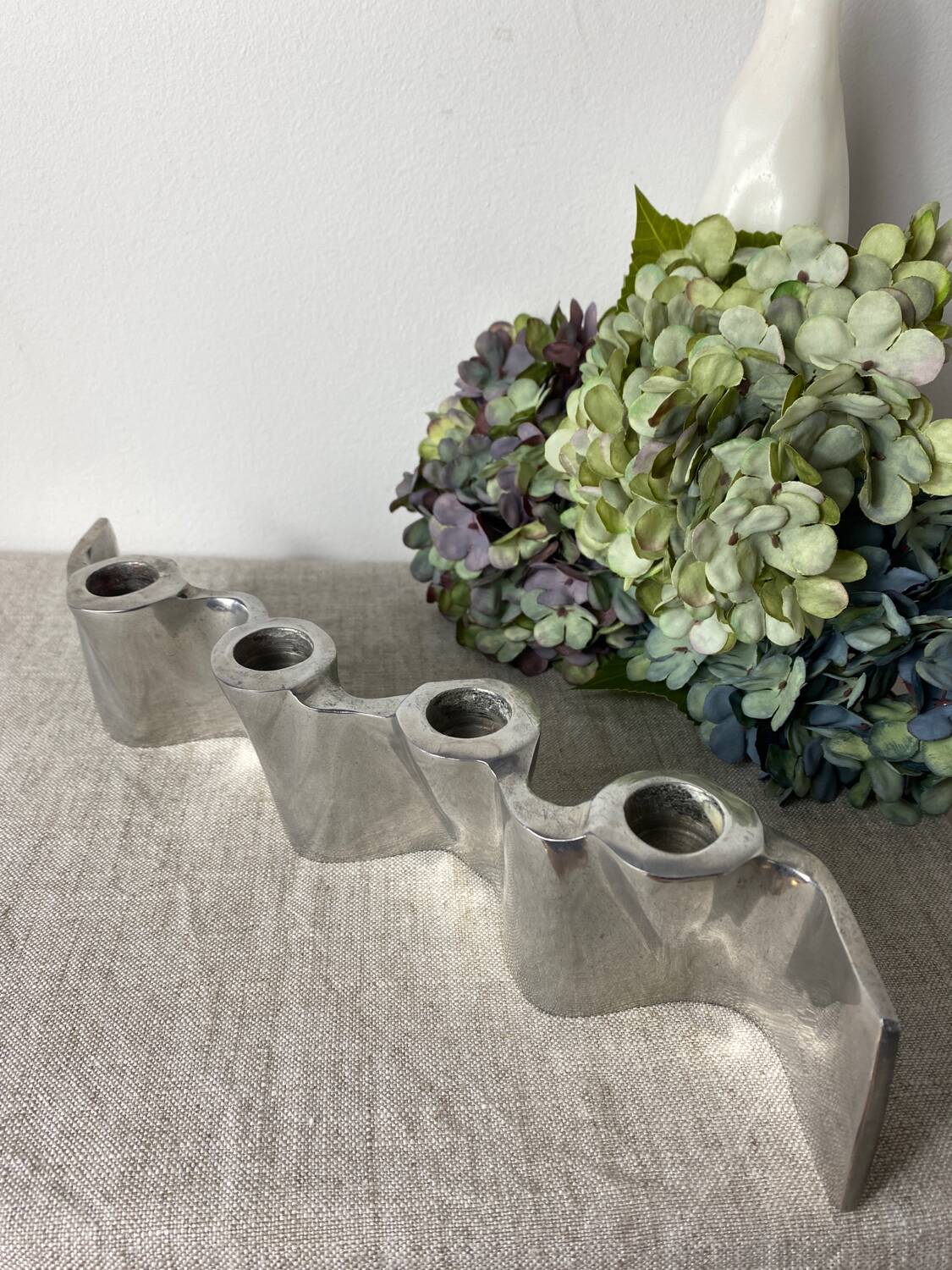 Brushed aluminum candle holder