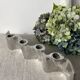 Brushed aluminum candle holder