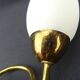 Vintage brass wall light with 3 glass tulips.