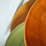 Set of green and amber enamelled plates
